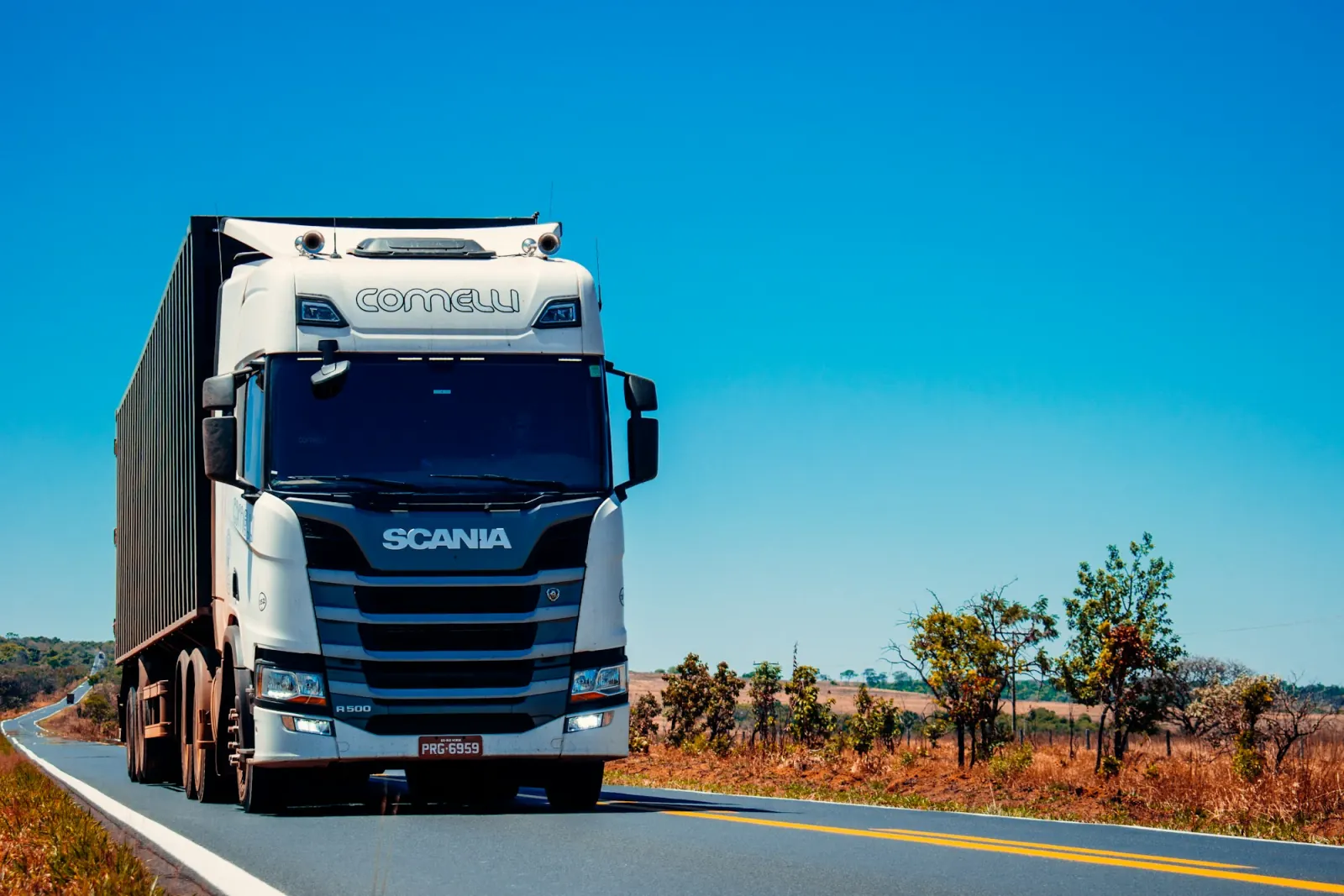 Articulated freight truck driving on a highway
